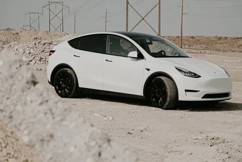 White Tesla Model Y SUV with showroom-clean exterior